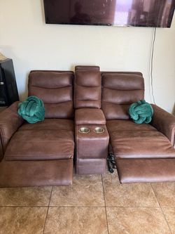 2 reclining sofas plus free Coffee table