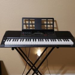Brand new Casio 61 portable keyboard with stand