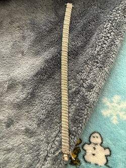 1/4 cttw Diamond and silver tennis bracelet.