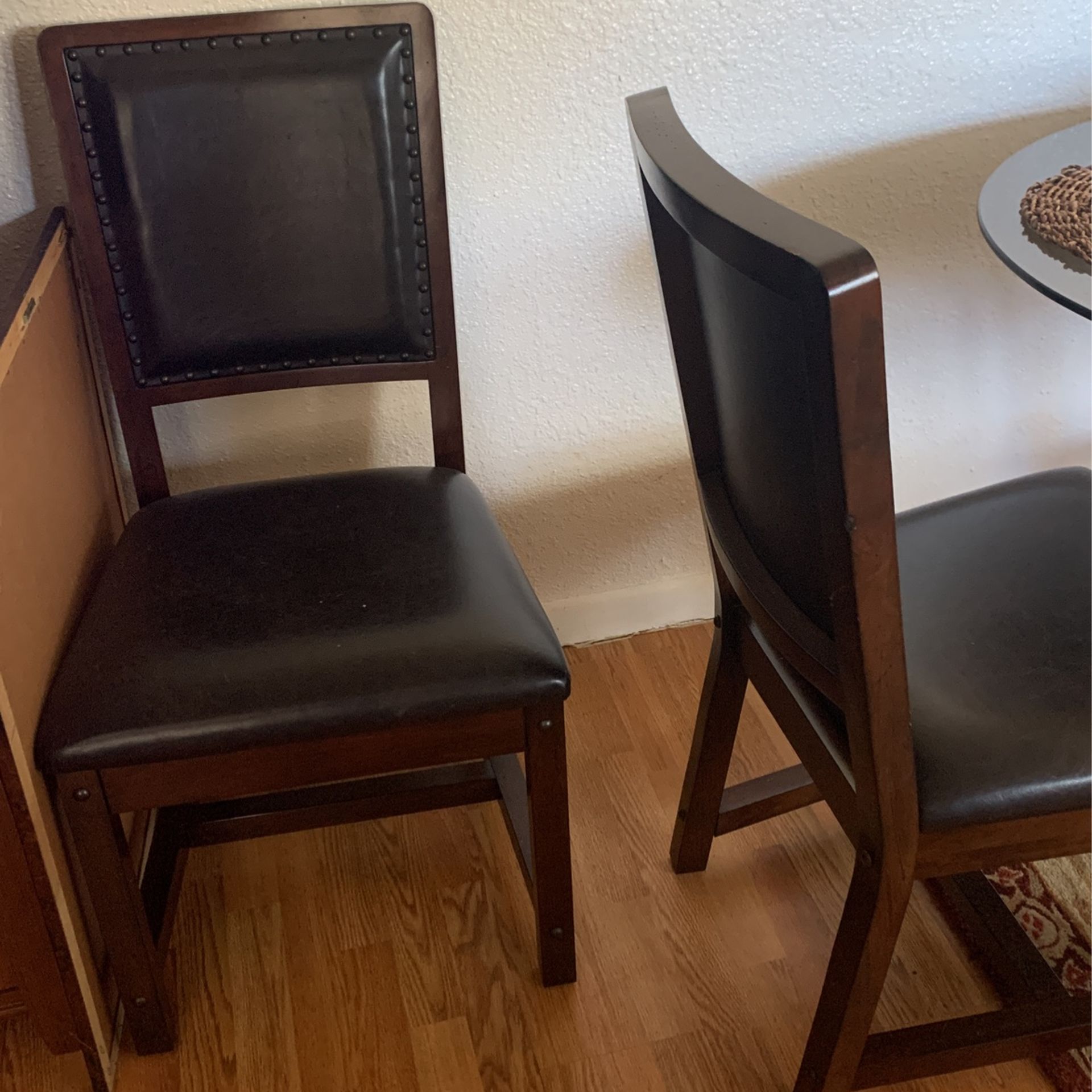 2 Chairs and a Sofa Table. Chairs are In Great Condition, Real Leather