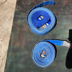 2 inch fire hoses both approximately 60 to 75 feet long