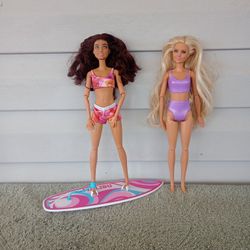 2 11" Barbie dolls with a surf board 