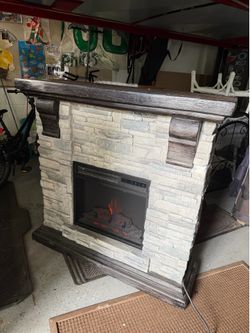40 in. Freestanding Faux Stone Electric Fireplace TV Stand in Gray with Mantel