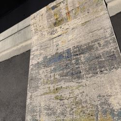 Selling a Ruggable 5x7 washable rug in a beautiful watercolor neutral abstract pattern.