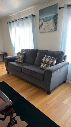 Both gray couches