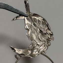 Artisan Sterling Silver Moon Face Pendant with Diamond-Cut Detailing