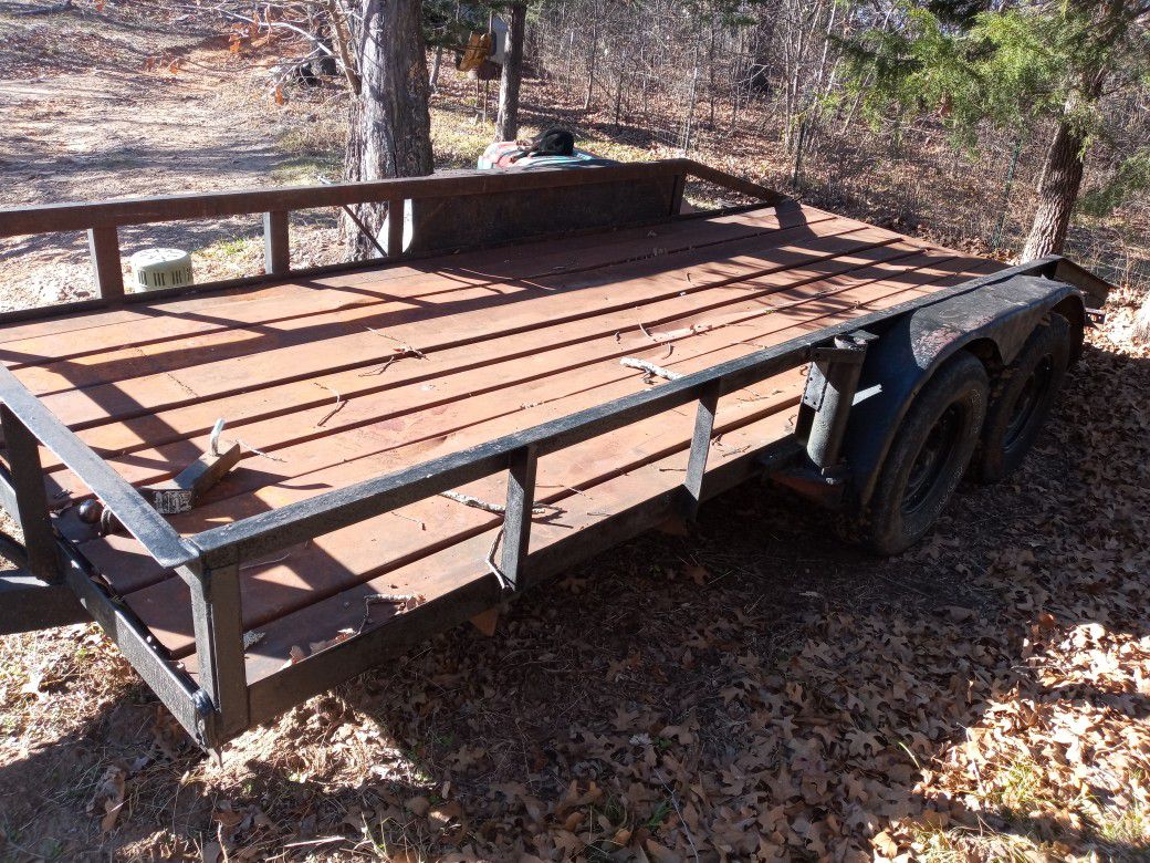 All steel flatbed trailer homemade solid trailer it was made in oklahoma so it has no tags and no registration