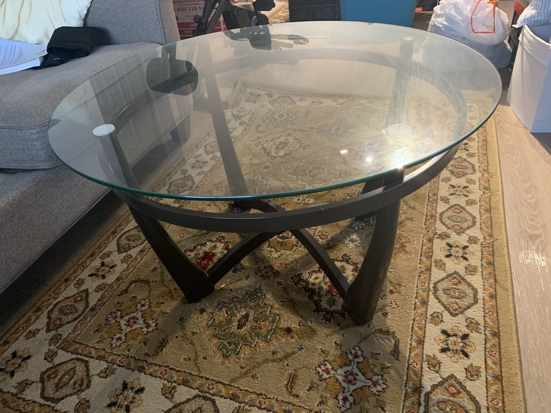 Signature design glass table