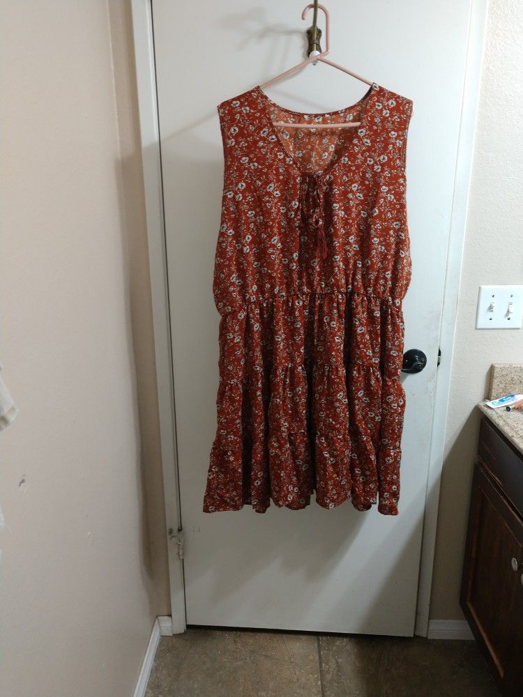Brown Dress With White And Blue Flowers