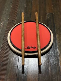 Drum pad and sticks