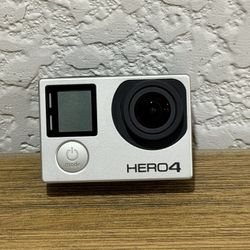 GoPro HERO4 Silver Edition Camera  Experience high-quality video with the GoPro HERO4. Sleek silver finish.  Like New ! Comes with a protecting case. 
