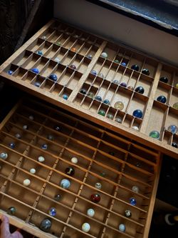 Two boxes of assorted vintage marbles