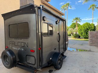 2018 Travel Lite Falcon FL-14 — Ultra-Lightweight & Aerodynamic! Looking for an easy-to-tow camper without buying a giant truck? The 2018 Travel Lite