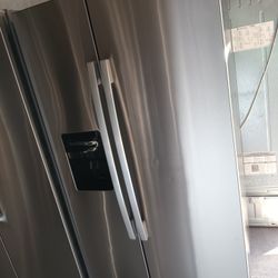 Amana  Refrigerator Side By Side Stainless Steel Everything Works Good 