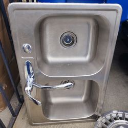 Kitchen sink with faucet