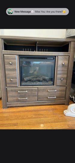 TV stand with remote control fireplace $100 or best offer