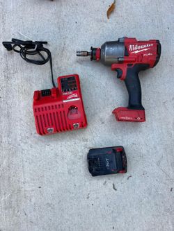 Milwaukee M18  FUEL ONE- KEY 18v lithium-Ion impact 1/2” comes with battery/charger asking $325 