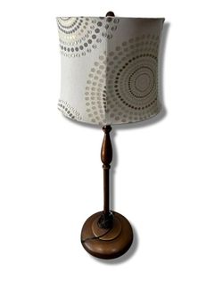 NY: Tall bronze lamp with neutral color patterned shade