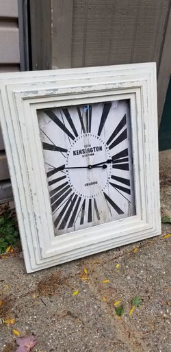 Large clock with aged appearance