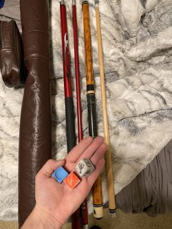 2 pool sticks with case and bunch of chalk (more in case)