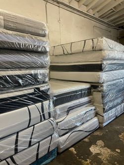 Queen Size Mattress Pillow Top 12"    New Mattress In A Plastic Sealed.  We offer same day delivery