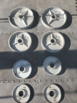 Olympic Weight Set Includes 2x35lbs 2x25lbs 2x10lbs 2x5lbs That's 150lbs all together selling all together