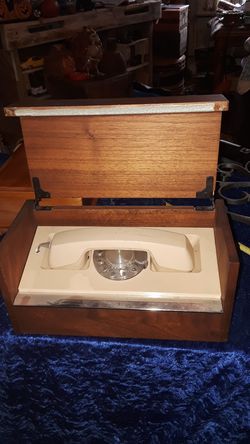 Antique rotary phone in nice little box with lid needs good cleaning but otherwise very good condition $35