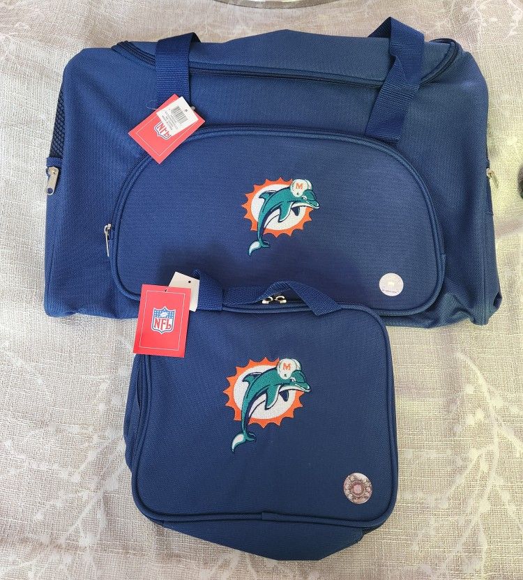 Set of 2 Miami Dolphins travel duffle Tote Bag with square insulated lunch bag, both have 2 handles and 2 zippers. Dark blue with the 1 Logos