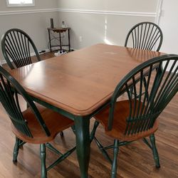 Kitchen Table & 4 Chairs. 60x38 plus leaf which is 18x38. Great condition with 1 small water spot.