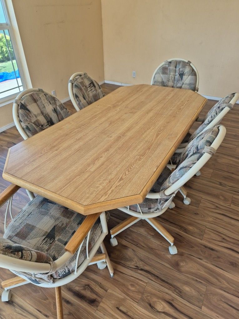 Dinning Room Table with 6 Padded Chairs