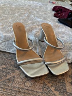 Womens size 8 silver heels. Selling for $5
