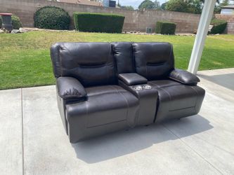 Leather reclining loveseat/couch