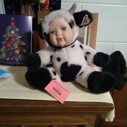 SHOW STOPPERS, PRESENTS MILKIE PORCELAIN COW DOLL FROM THE BORN TO BE WILD SERIES.