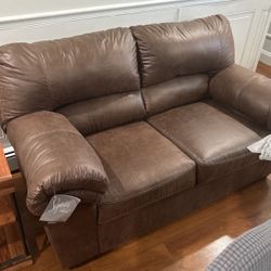 Brown faux Leather loveseats