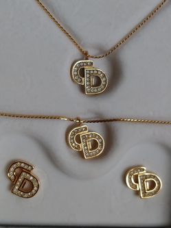 Christian Dior - Signed Necklace, Bracelet and Clip-On Earrings.