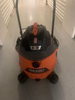 Rigid wet/dry vacuum