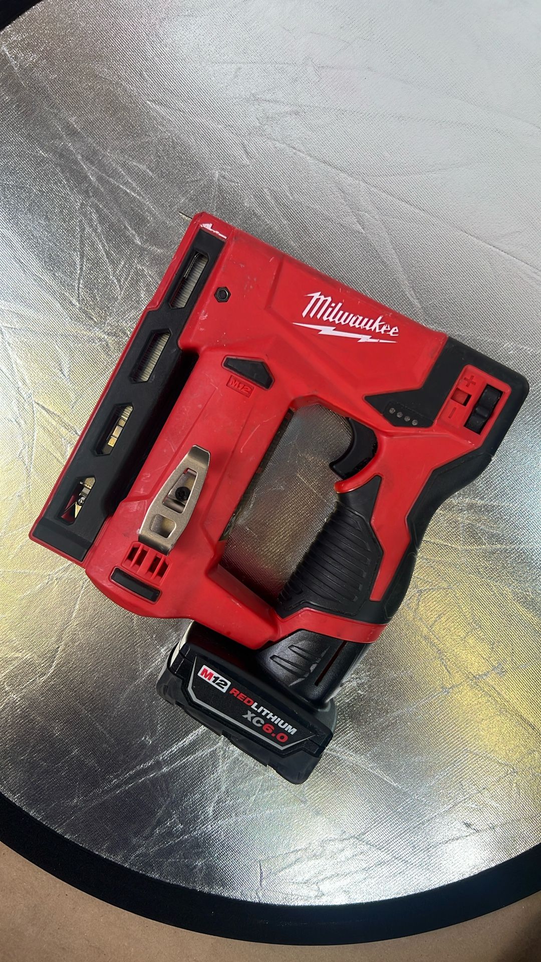 Used Milwaukee 2447-20 M12â„¢ 3/8" Crown Stapler With Single Battery (no Charger)
