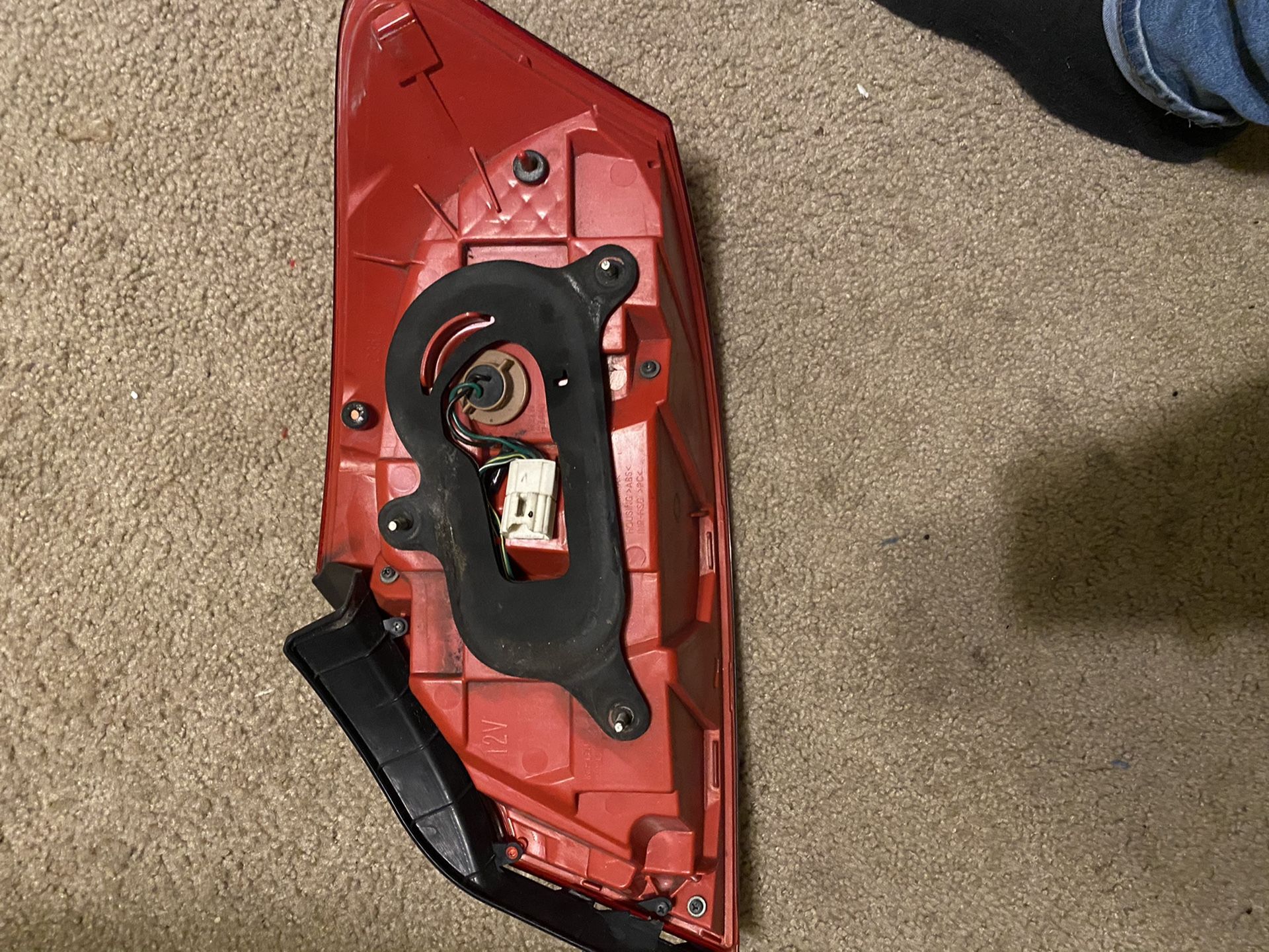 Infiniti G37 sedan driver side tail light