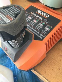 Ridgid charger  and one battery  12 v