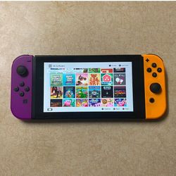 NINTENDO SWITCH V2 with 100 SWITCH GAMES MARIO KART,MARIO PARTY,MARIO DELUXE,MARIO 3D WORLD,ZELDA,POKEMON