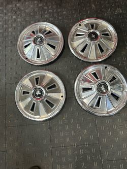 66 Mustang 0em hubcaps
