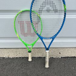 Two Kids Head and Wilson Tennis Rackets