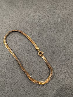 14k yellow gold 7’ braided bracelet
