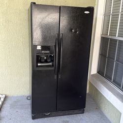 Modern Black Whirlpool Refrigerator