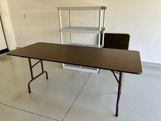 Table 6‘ x 36“ wide . Basic plywood or laminate tables with metal wishbone folding legs manufactured for events and banquets.