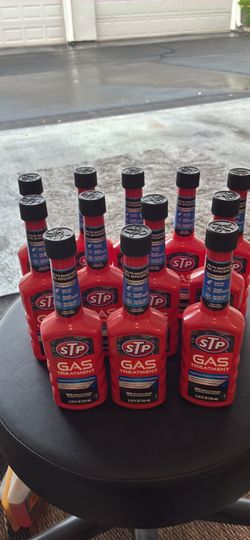 12 bottles of STP FUEL CLEANER
