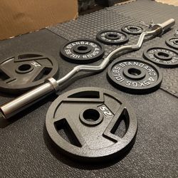 BRAND NEW Olympic Curl Bar With Cooper Bearings &  Cast Iron Weight Plates: 25#, 10#, 5 and 2.5#  (105 pounds)