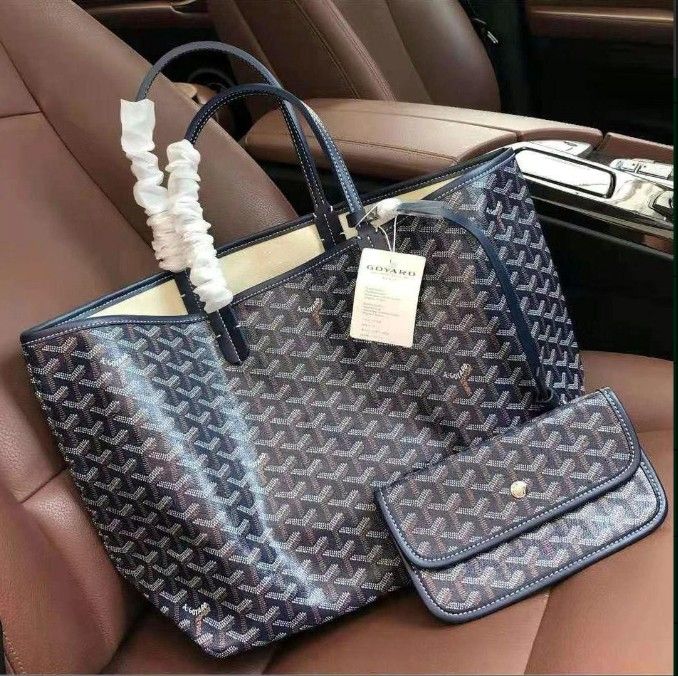 This new women's bag is a high-end large-capacity high-end hand-held shoulder large royal blue tote bag