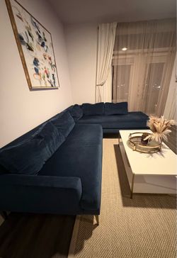 West Elm L shaped blue couch