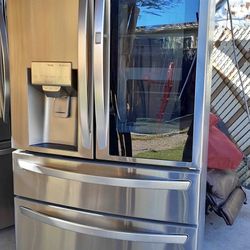 Lg french 4 doors stainless Steel refrigerator DELIVERY AVAILABLE